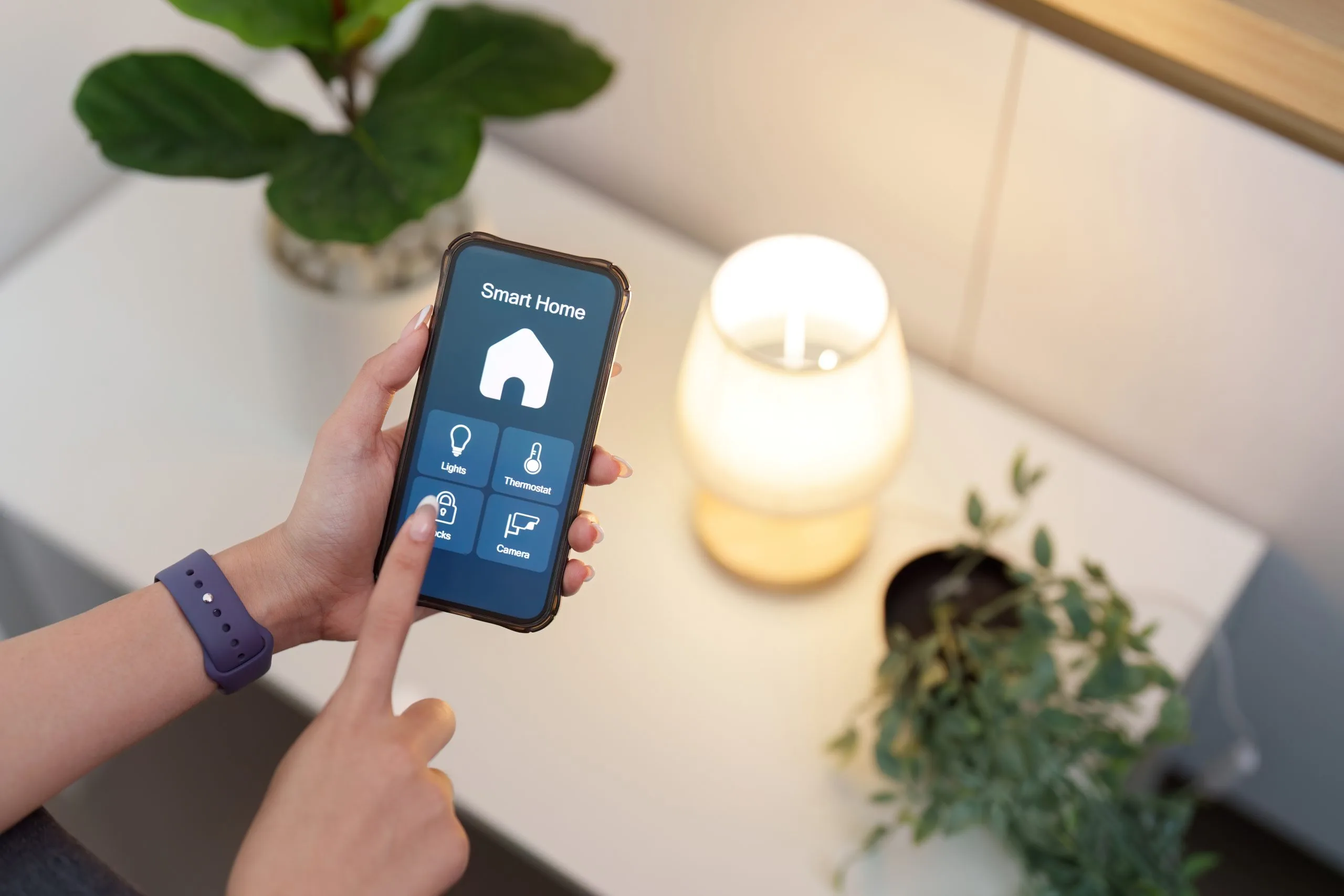 Home security systems Winnipeg being controlled via smartphone for enhanced safety